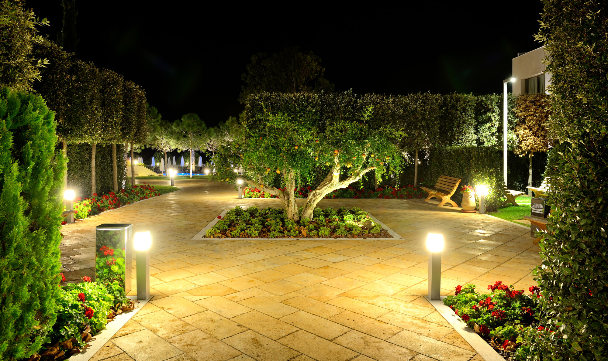 garden with bollard lights after lighting installation in jupiter